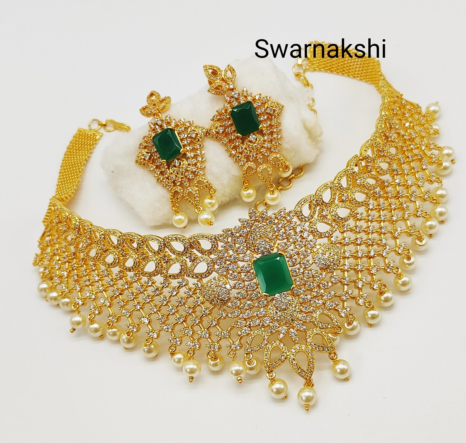 CZ choker necklace designs grand look with green stone Swarnakshi Jewels